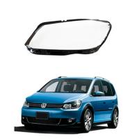 Стекло фары Volkswagen Touran (2010-2015) левое.