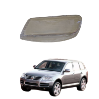 Стекло фары Volkswagen Touareg 2002-2005г левое
